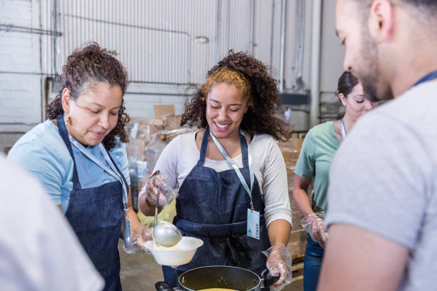 istock Family members work together to serve soup 1425562578