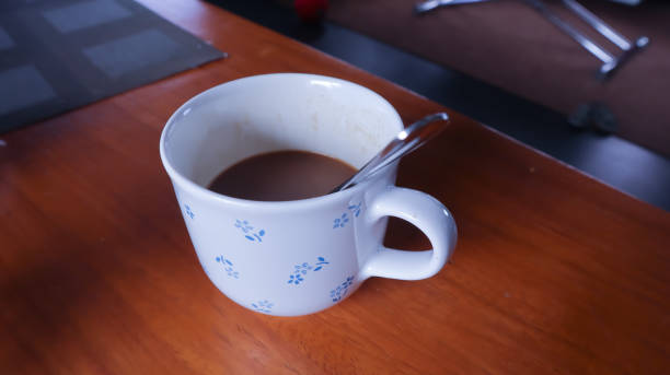 istock small coffee cup on top of the coffee table 1425566021