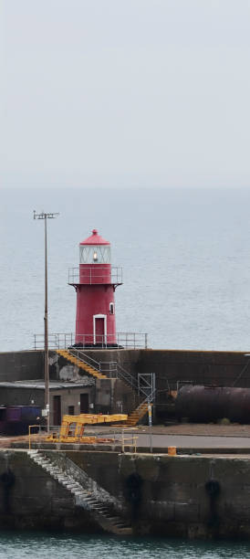 istock Harbor of Wexford with Red Lighthouse 1425566392