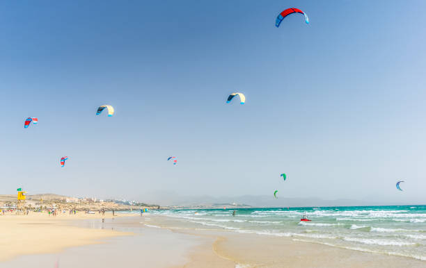 Kite - Surfer's Paradise, Playa De Sotavento on Fuerteventura Kite - Surfer's Paradise, Playa De Sotavento on Fuerteventura kite sailing stock pictures, royalty-free photos & images