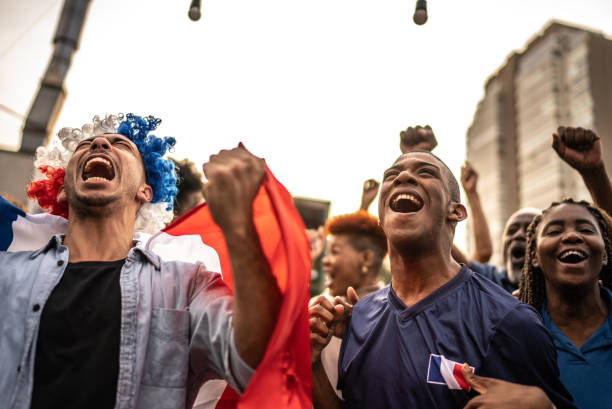 istock French team fans celebrating 1425575256