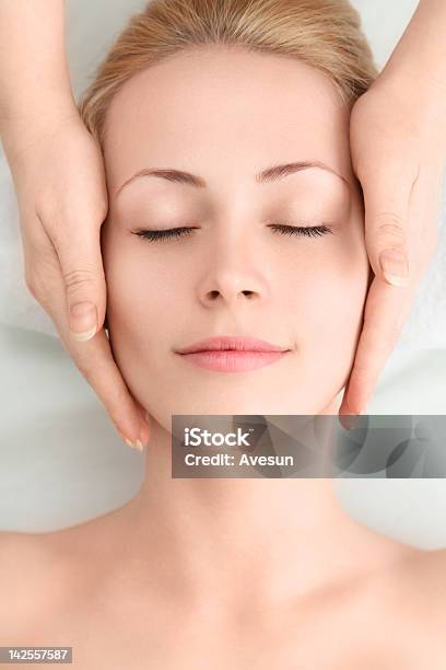 Young Woman Having Face Massage Stock Photo - Download Image Now - Facial Massage, Head Massage, Only Women