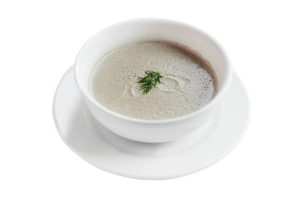 Mushroom cream soup isolated on white