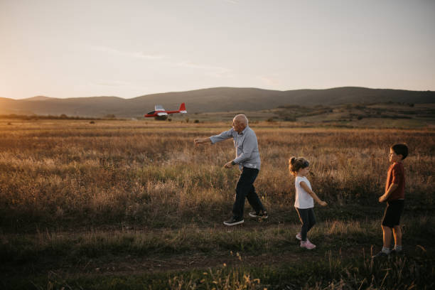 istock Family having fun in nature 1425579600