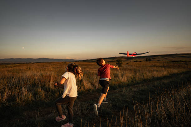 istock Kids playing in nature 1425585381