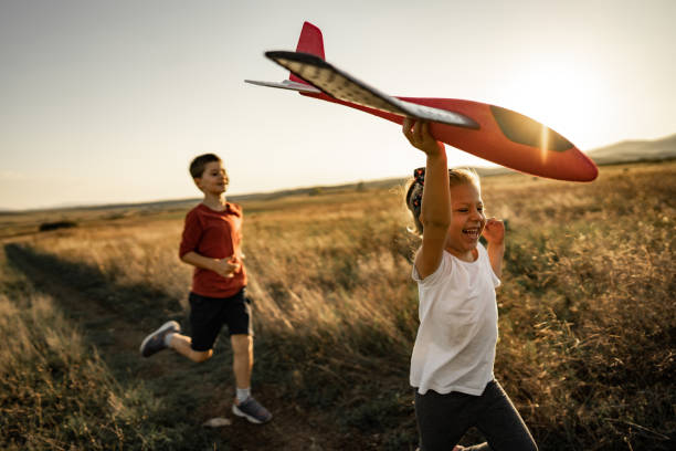 istock Brother and sister playing 1425585531