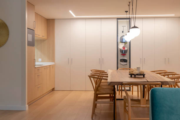 istock Modern and minimalist interior open design dining and kitchen with wooden table 1425586948
