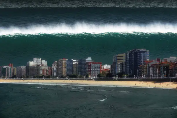 Photo of tsunami breaking on city coast with big waves