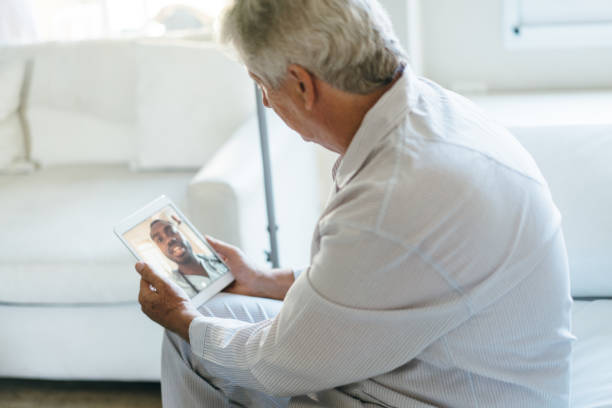 istock Senior man on telemedicine video call 1425595125