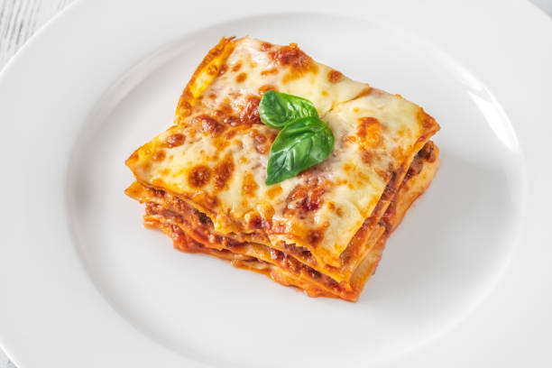 istock Portion of lasagne on white plate 1425596204