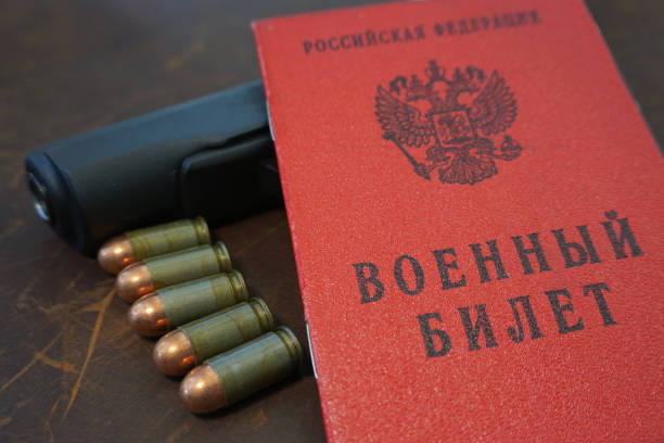 istock Russian military ID and pistol 1425596916