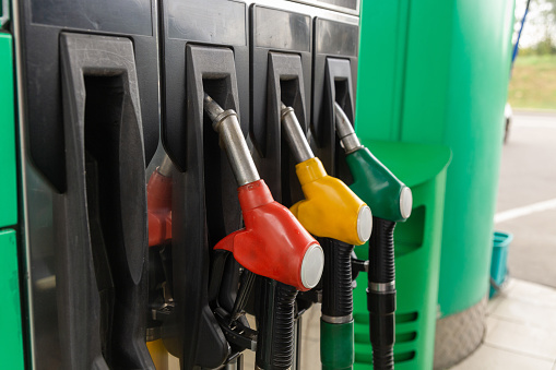 Colorfull fuel gasoline dispenser background. Close up of petroleum gasoline station service - oil refueling and refilling for car transportation concept