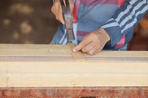 Thai carpenter at work