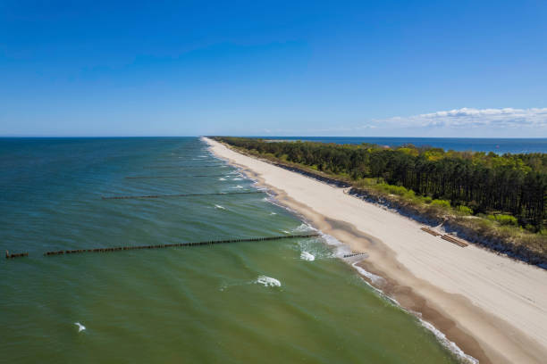 istock long peninsula with beautiful sandy beach on a summer day (aerial view) 1425604205