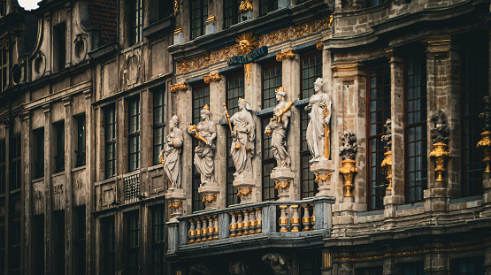 facade of the building The Fox (maison du Renard) with the sculptures representing Justice, Europe, Asia, America and Africa on the Grand-Place Brussels