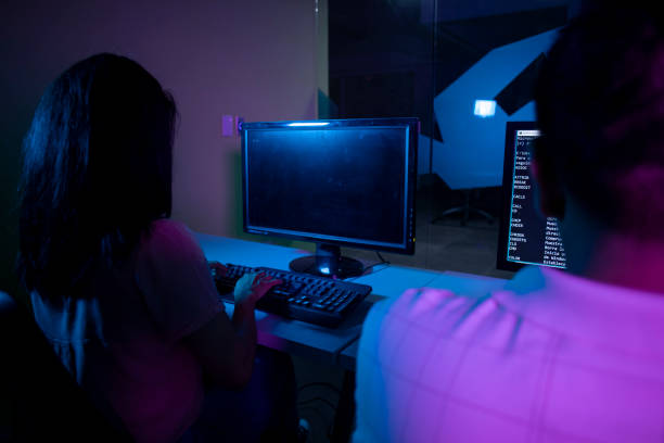 istock man and woman working at the computer 1425605930