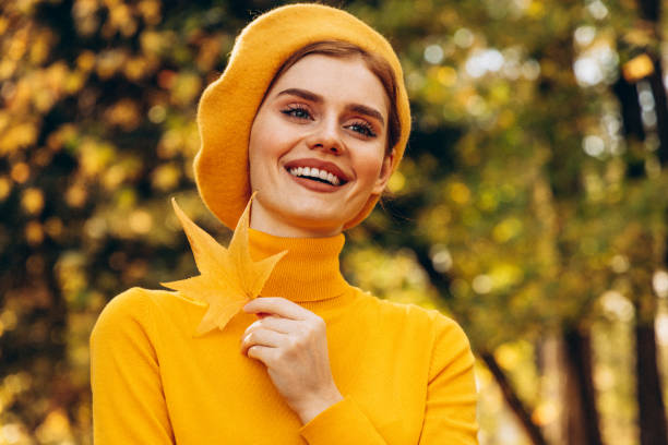istock Beautiful woman enjoying autumn 1425606878