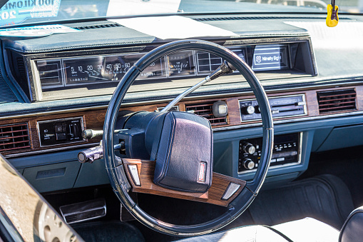 Oldsmobile 98 interior and dashboard. Vintage luxury american car from 1970's