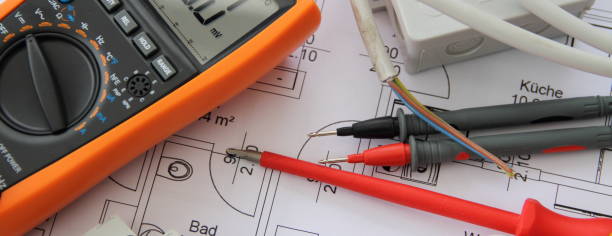 istock Sockets with a screwdriver and a measuring device on a circuit diagram 1425620098
