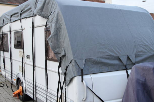 istock a caravan with a gray tarpaulin 1425620167