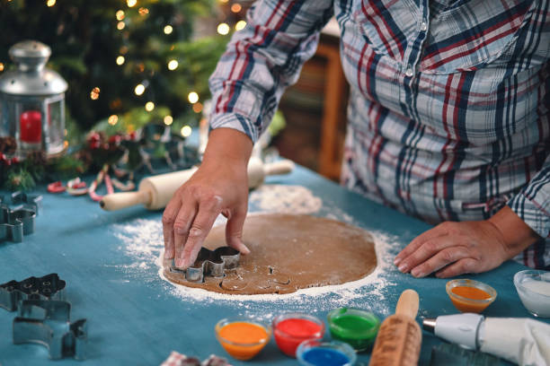 istock Preparing Gingerbread Christmas Cookies in Domestic Kitchen 1425622580