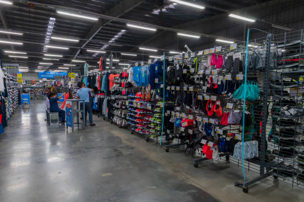 Indian buyers checking out various sports goods on sale at Decathlon store of Uluberia, Howrah. stock photo
