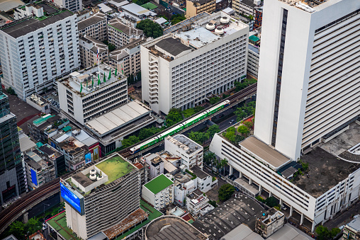 Aerial view of BTS skytrain between the building in bangkok, Thailand