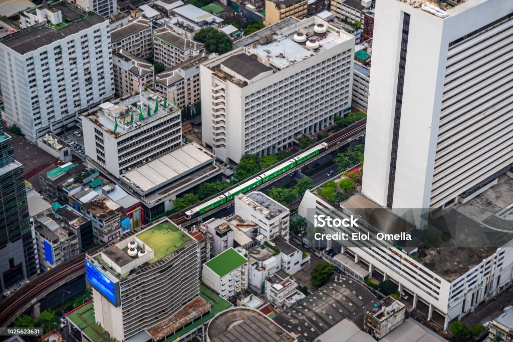 View of BTS skytrain from the top Aerial view of BTS skytrain between the building in bangkok, Thailand Bangkok Stock Photo