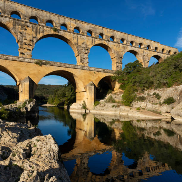 Vertical view of famous Pont du Gard, old roman aqueduct in France, Europe