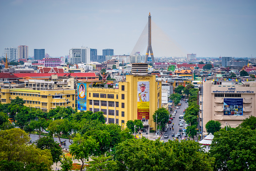 Panorama view of Bangkok from Golden Mountain on sunset cloudy sky, Thailand. Traditional architecture of Bangkok from the height of bird flight.