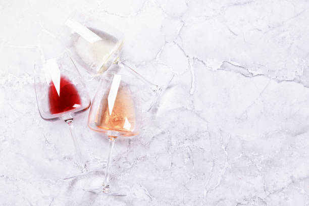 istock White, rose and red wine glasses 1425627094