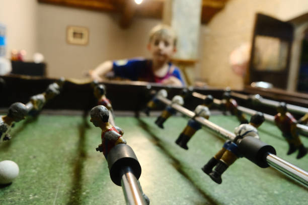 istock A boy playing table football 1425627517
