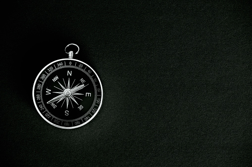 Compass on the black background.