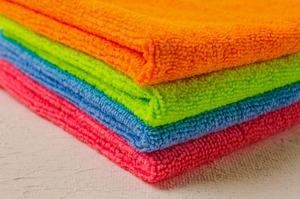 A stack of colored cloth , microfiber, for cleaning the house, on a white table, horizontal, no people, A stack of colored cloth , microfiber, for cleaning the house, on a white table, horizontal, no people, microfiber stock pictures, royalty-free photos & images