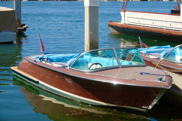 istock Vintage wood boat docked in the harbor 1425637358