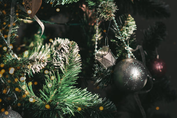 istock Silver and pink Christmas decorations on the Christmas tree 1425640629