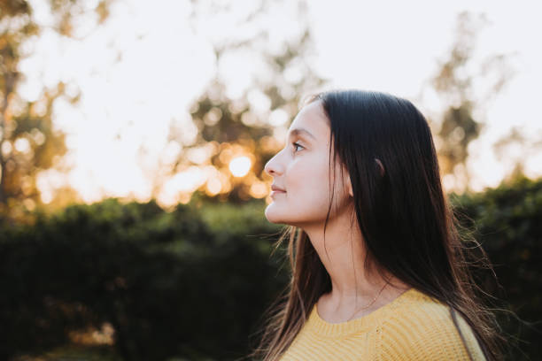 istock serene young woman connecting with nature. Mental healing 1425642467