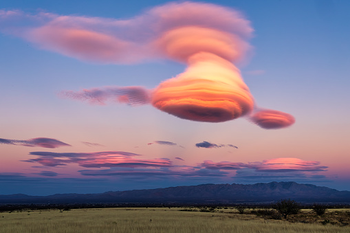 A lenticular cloud over the valley in the southern arizona high desert