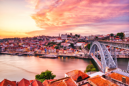Porto Aerial Cityscape with Luis I Bridge and Douro River at Amazing Sunset, Portugal
