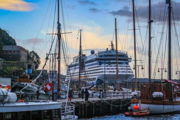 Awesome skies and a cruise ship in Oslo Harbor stock photo