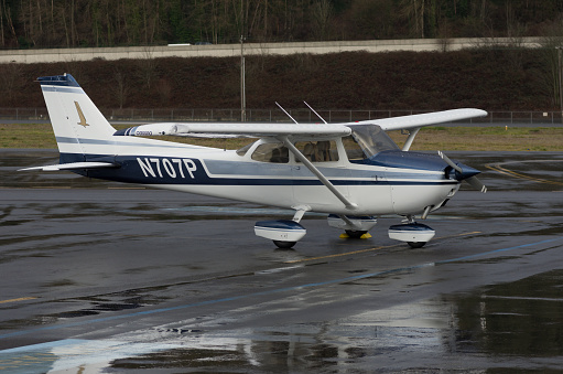 Bolingbrook, IL, USA - December 1, 2013: A Piper Malibu Mirage airplane sitting on the ramp at the Bolingbrook Clow Airport waiting to depart. 
