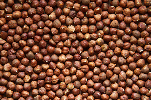 Hazelnuts texture background. Top view.