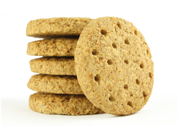 istock Stacked oat cereal cookies isolated on white background 1425666396