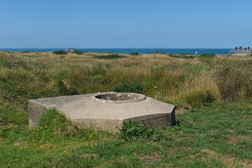 Old German World War 2 concrete bunker for a machine gun position at Pointe du Hoc, Cricqueville-en-Bessin, Normandy, France