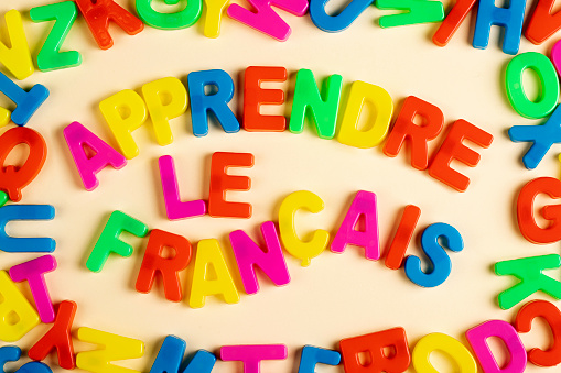 Text Learn French in French made with colorful letters