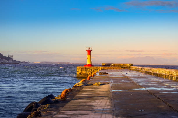 Colorful Kalk bay harbor lighthouse in cape town