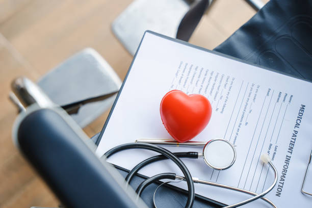 istock close up heart ball and stethoscope on empty wheelchair. 1425708506