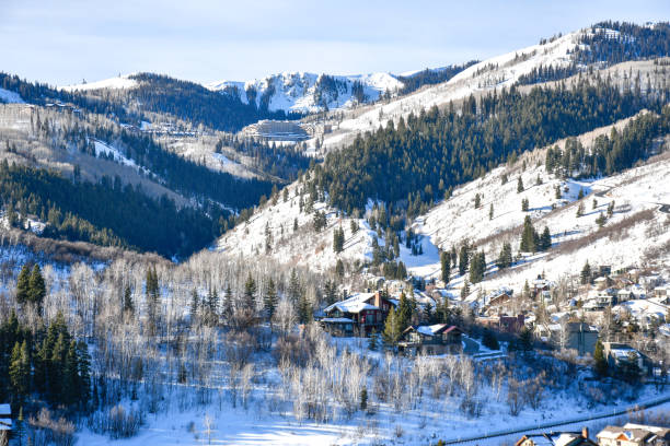 Vacation homes on the hillside in Park City ski area during winter in the Wasatch Mountains near Salt Lake City, Utah Vacation homes on the hillside in Park City ski area during winter in the Wasatch Mountains near Salt Lake City, Utah deer valley resort stock pictures, royalty-free photos & images