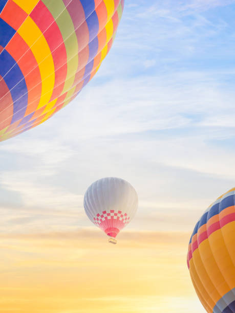 istock multi color hot air balloon flying over sunrise sky 1425720362