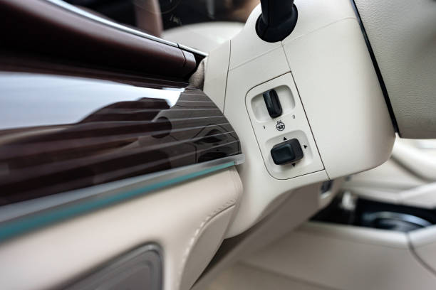 istock Modern luxury car interior with steering wheel, multimedia and dashboard 1425720412